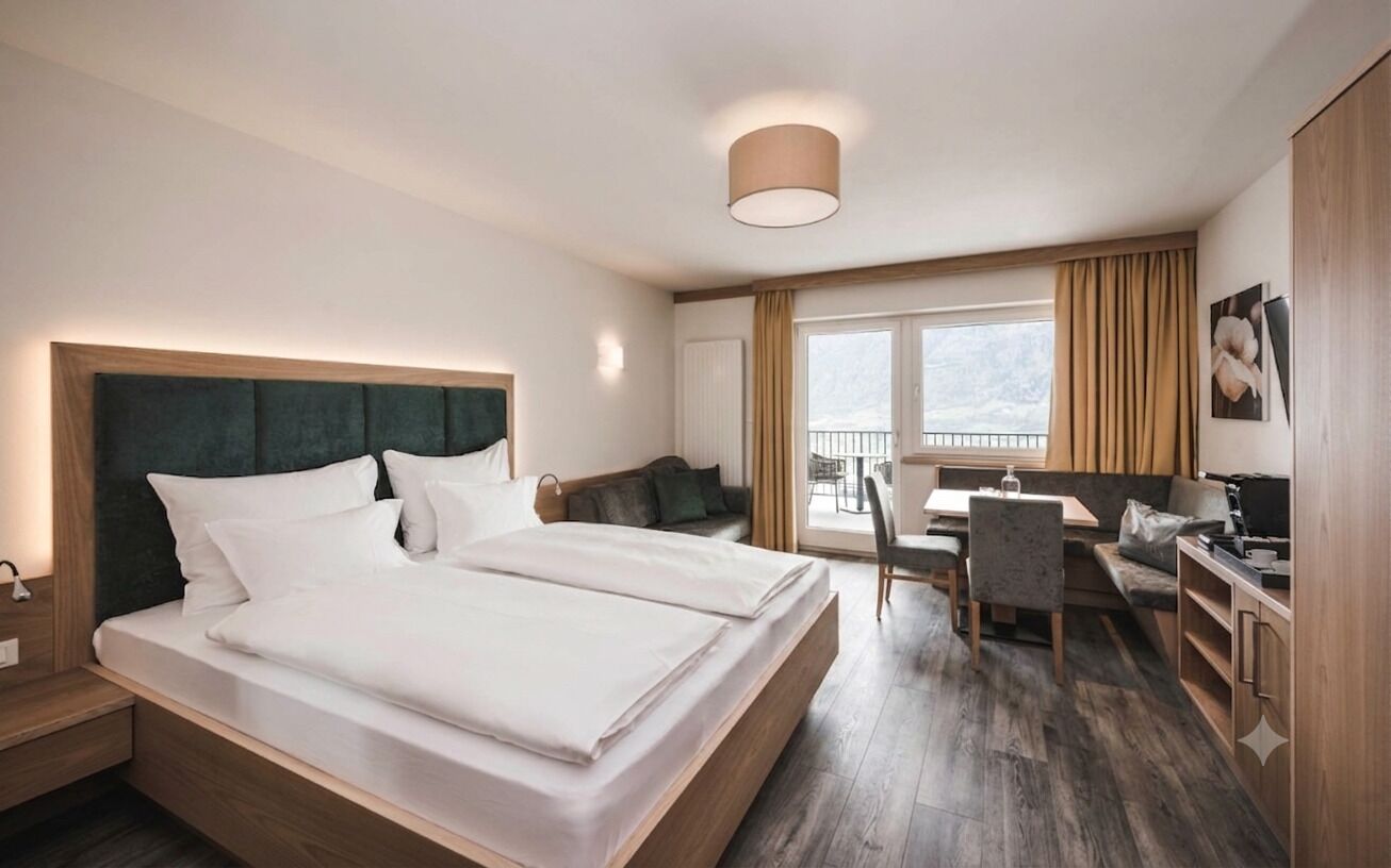 Comfort Double Room, Balcony, Mountain View | Minibar, in-room safe, soundproofing, bed sheets