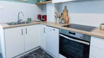 Apartment | Private kitchen | Full-size fridge, oven, dishwasher, electric kettle
