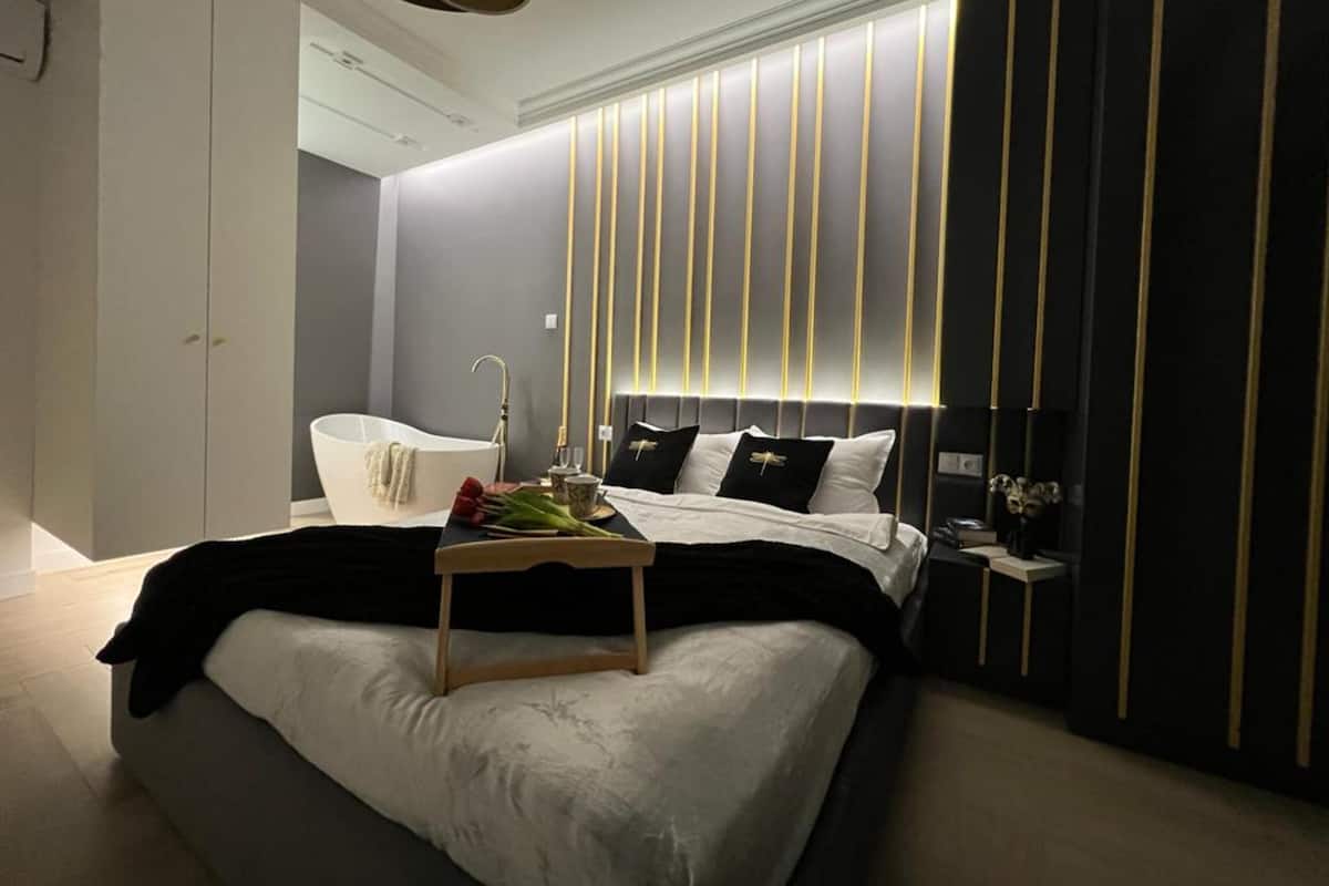 Superior Apartment, City View | Down comforters, minibar, laptop workspace, iron/ironing board