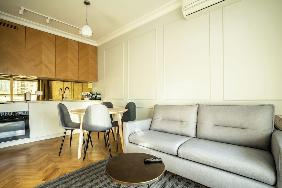 Standard Apartment, 1 Bedroom, Courtyard View | Down comforters, minibar, laptop workspace, iron/ironing board