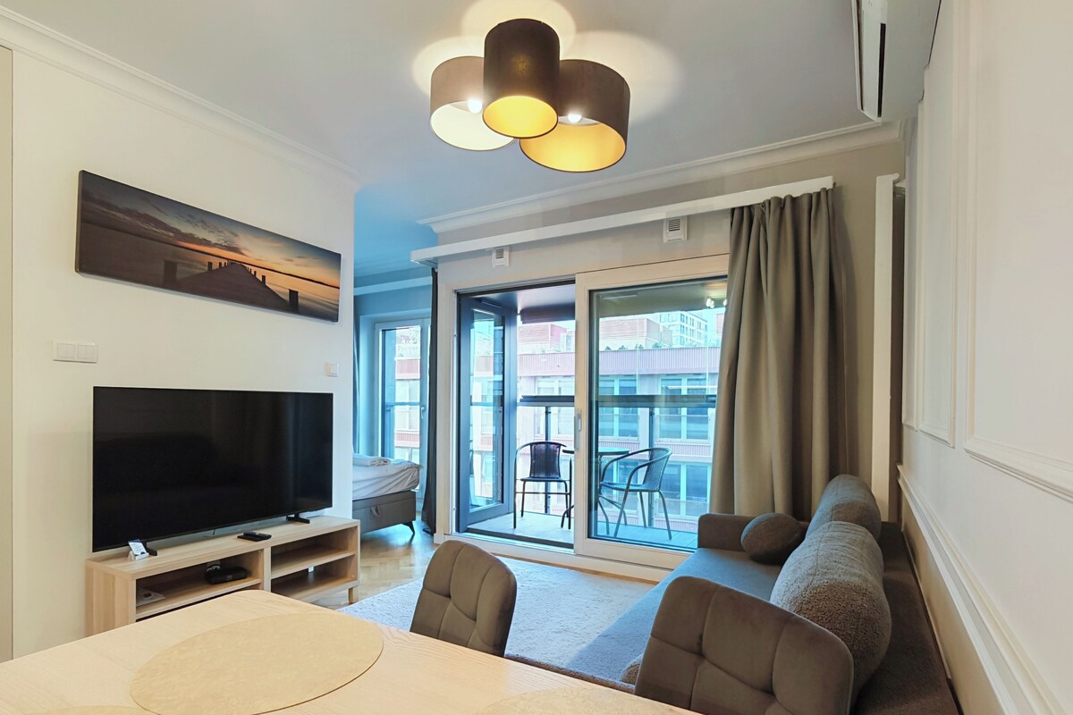 Standard Apartment, 1 Bedroom, Courtyard View | Down comforters, minibar, laptop workspace, iron/ironing board