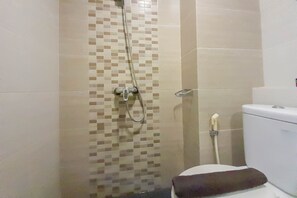 Studio | Bathroom - Comfort And Cozy Studio Student Castle Yogyakarta Apartment (Depok)