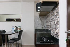 Apartment | Private kitchen - Comfort And Cozy Stay 2Br At 29Th Floor Transpark Cibubur Apartment (Depok)