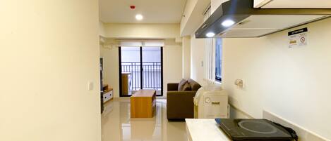 Apartment | Private kitchen | Fridge, stovetop, rice cooker, dining tables