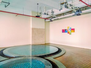 Outdoor pool - Comfortable Studio Apartment At Atlanta Residences (Depok)