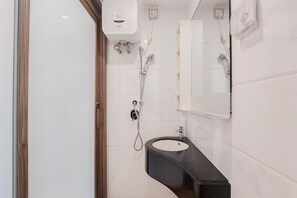 Bathroom - Cozy Design Studio At 21St Floor Sky House Bsd Apartment (Pagedangan)