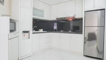 Apartment | Private kitchen | Fridge, microwave, stovetop, rice cooker