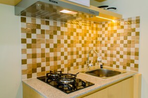 Studio | Private kitchen - Comfortable And Minimalist Studio At Amethyst Apartment (Jakarta)
