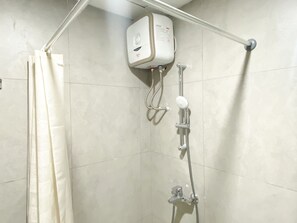 Studio | Bathroom | Shower, towels, soap, shampoo - Modern Look Studio At Pollux Chadstone Apartment (Cikarang)