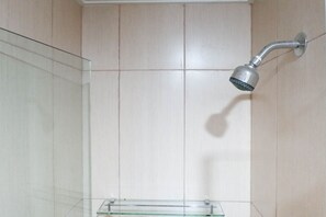Studio | Bathroom | Shower, towels, soap, shampoo - Good Deal Minimalist Studio Apartment At Tamansari Papilio (Surabaya)