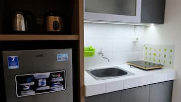 Departamento | Cocina privada | Refrigerador, parrilla de estufa y arrocera