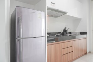 Apartamento | Cocina privada | Frigorífico, placa de cocina y arrocera