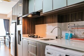 Studio | Private kitchen - Homey And Cozy Living Studio At Tamansari The Hive Apartment (Jakarta)