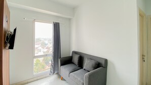 Unclassified image, 2 of 19, button - Simply Look 1Br With Extra Room Patraland Urbano Apartment (Bekasi)