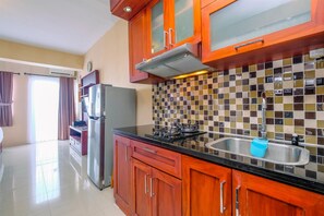 Studio | Private kitchen - Comfy Studio At Park View Condominium Apartment (Depok)