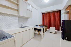 Apartment | Private kitchen - Warm And Enjoy Living 1Br Tree Park City Bsd Apartment (South Tangerang)