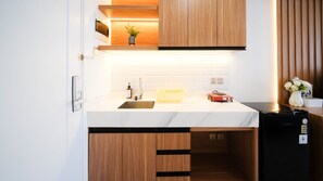 Studio | Private kitchen - New And Cozy Studio At 88 Avenue Apartment (Surabaya)
