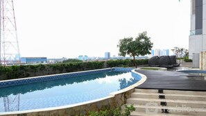 Outdoor pool - New And Cozy Studio At 88 Avenue Apartment (Surabaya)