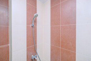 Shower, towels, soap, shampoo - Nice And Simply Studio Room At Saladdin Mansion Apartment (Depok)