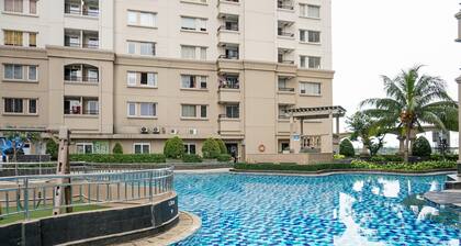 Homey And Warm 2Br At Marina Ancol Apartment