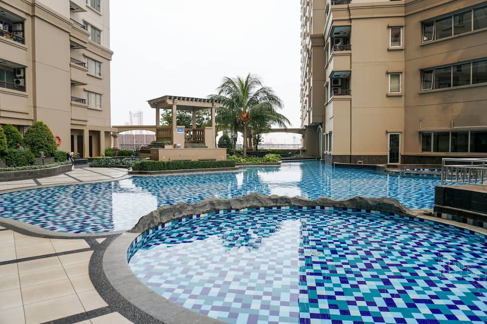 Homey And Warm 2Br At Marina Ancol Apartment