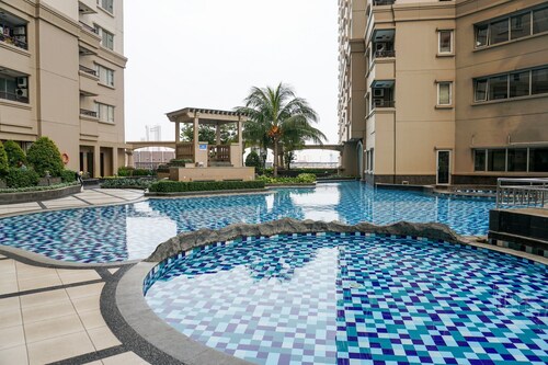 Homey And Warm 2Br At Marina Ancol Apartment