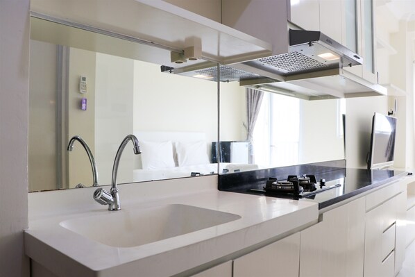 Studio | Private kitchen - Homey And Nice Studio At Signature Park Grande Apartment (Jakarta)