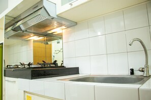 Studio | Private kitchen - Homey And Cozy Stay Studio At Margonda Residence 2 Apartment (Depok)