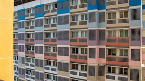 A multi-story building with a repeating pattern of balconies and windows. - Homey And Cozy Stay Studio At Margonda Residence 2 Apartment (Depok)