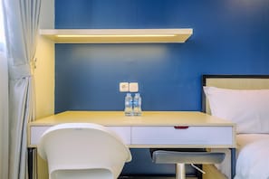 Living area - Elegant Studio At Evenciio Margonda Apartment (Depok)