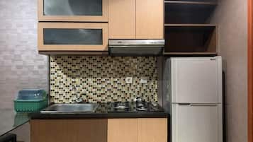 Apartment | Private kitchen | Fridge, stovetop, rice cooker, dining tables