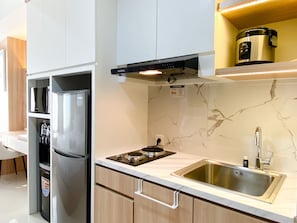 Studio | Private kitchen - Comfortable Stay Studio At Pollux Chadstone Apartment (Cikarang)