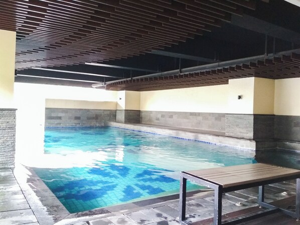Outdoor pool - Modern Studio Room Apartment At Tamansari La Grande (Bandung)