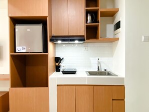 Estudio | Cocina privada | Frigobar, parrilla de estufa y arrocera 