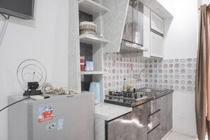 Studio | Private kitchen - Cozy And Tidy Studio At Bassura City Apartment (Jakarta)