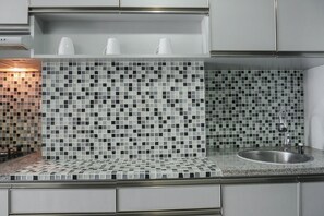 Studio | Private kitchen | Fridge, stovetop, rice cooker, dining tables