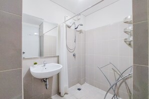 Studio | Bathroom | Shower, towels, soap, shampoo - Comfort Living Studio Apartment At Bintaro Plaza Residence Altiz Tower (South Tangerang)