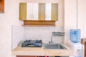 Studio | Private kitchen | Fridge, stovetop, rice cooker - Cozy Stay Studio At Cervino Village Casablanca Apartment (Jakarta)