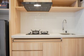 Studio | Private kitchen - Fully Furnished With Cozy Design Studio Tokyo Riverside Pik 2 Apartment (Teluknaga)