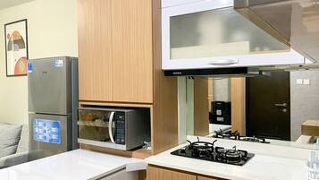 Apartamento | Cozinha privada | Geladeira, micro-ondas, cooktop, panela elétrica de arroz