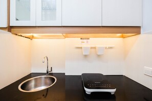 Studio | Private kitchen - Fully Furnished With Japanese Style Studio Azalea Suites Apartment (Cikarang)