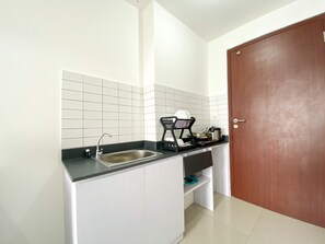 Studio | Private kitchen - Fancy Designed And Nice Studio At Sayana Bekasi Apartment (Tarumajaya)