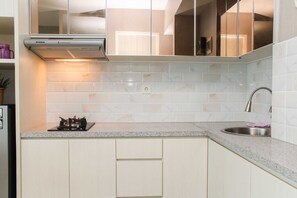 Private kitchen - Comfort And Best Deal Studio At Grand Kamala Lagoon Apartment (Bekasi)