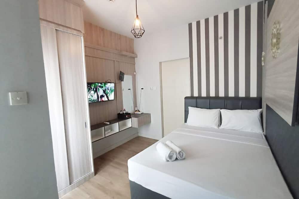 Homey And Cozy Living Studio Amartha View Apartment