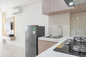 Estúdio | Cozinha privada | Geladeira, cooktop, panela elétrica de arroz
