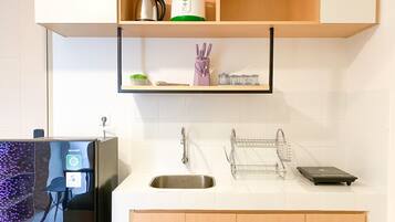 Apartment | Private kitchen | Fridge, stovetop, rice cooker, dining tables