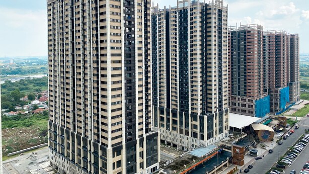 A high-rise residential building with multiple balconies and a modern architectural design. - Cozy Living And Comfort 3Br Meikarta Apartment (Cikarang)