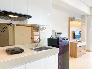 Studio | Private kitchen - Relaxing Studio At Vasanta Innopark Apartment (Cikarang)