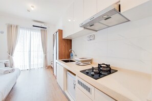 Estudio | Cocina privada | Frigobar, parrilla de estufa y arrocera 
