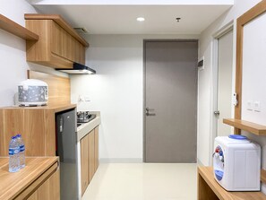 Apartamento | Cozinha privada | Geladeira, cooktop, panela elétrica de arroz